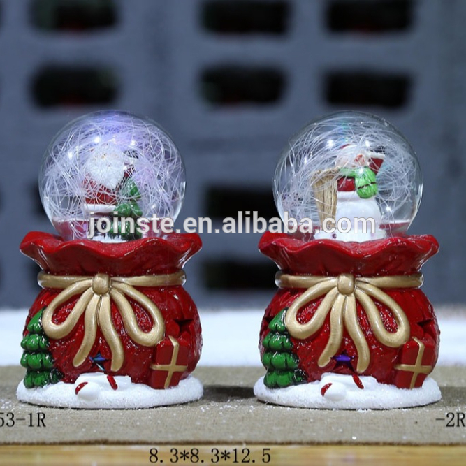 Ceramic Christmas shoes shaped with snow globe