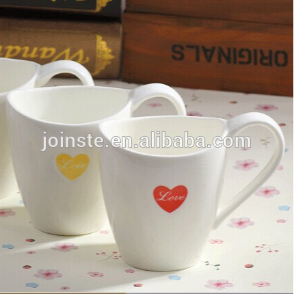 Valentine crescent-shaped ceramic cups with love heart