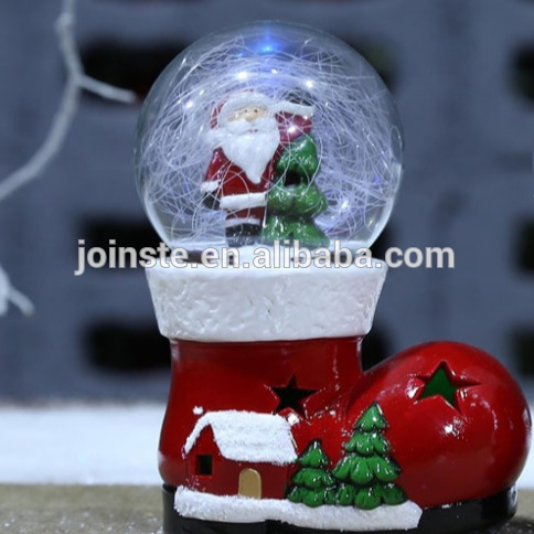 Ceramic Christmas shoes shaped with snow globe item