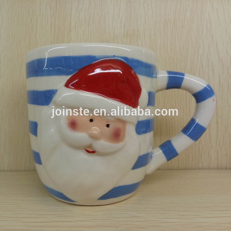 White and blue novelty Santa shaped ceramic milk mug