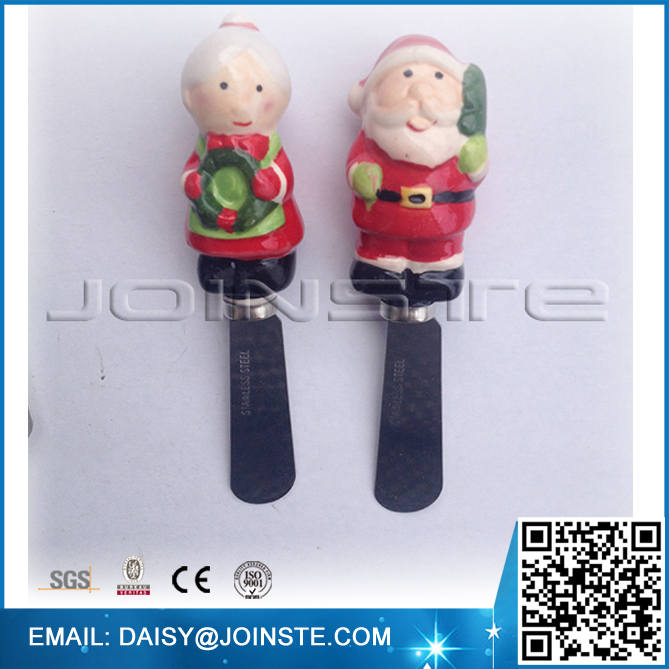 Mr and Mrs Claus butter spreader