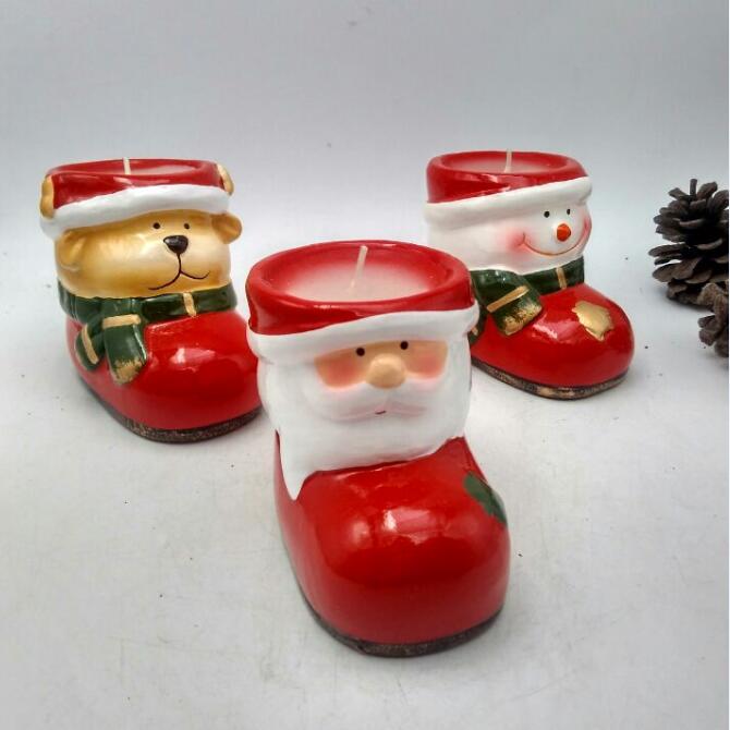 Boot shaped Christmas celebrating ceramic candle holders