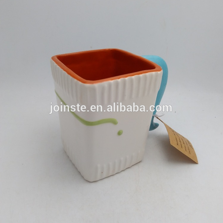 White square shaped ceramic coffee mug with handle